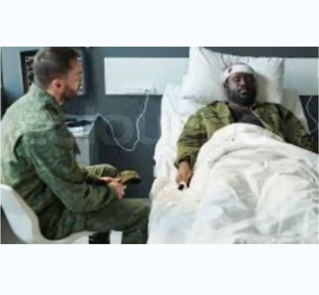 Veteran in hospital bed, click for content